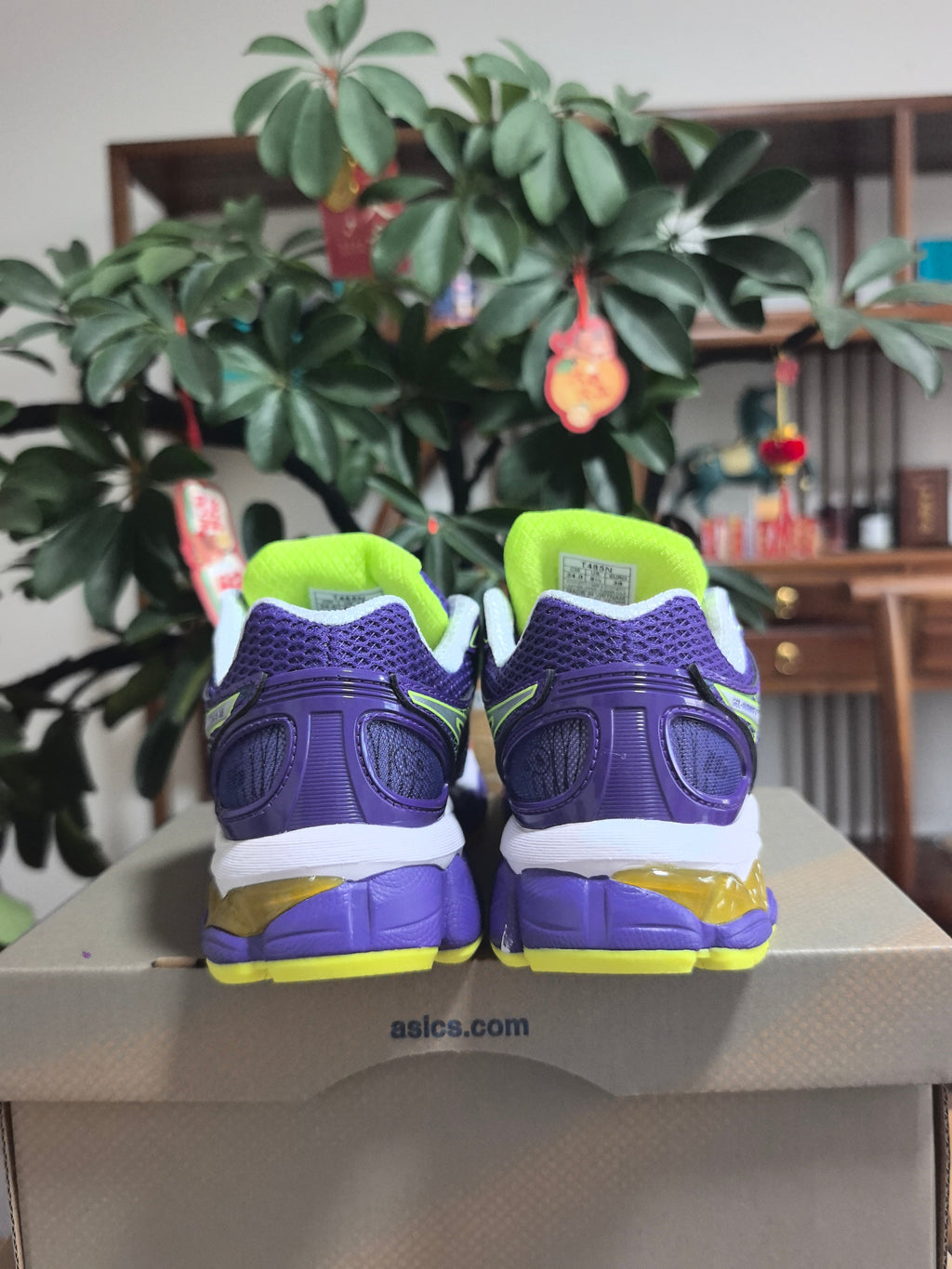 ASICS Gel-Nimbus 16 Sneakers in Purple Volt - product image from the listing.