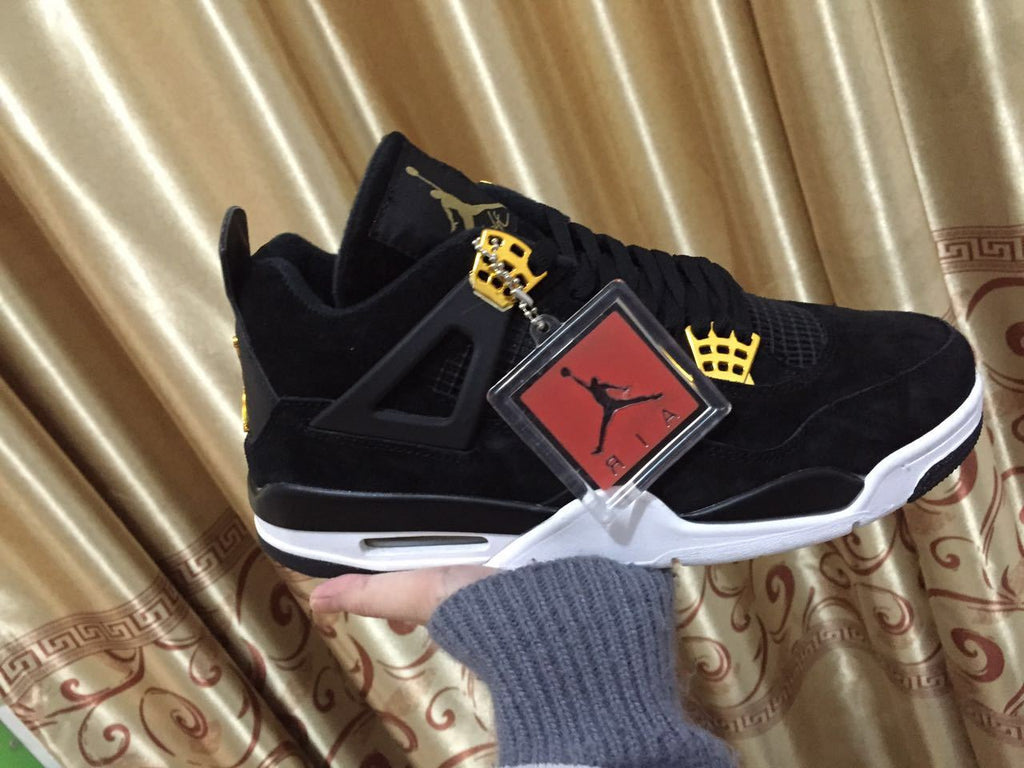 Jordan 4 High-Top Sneakers in Black and Gold - product image from the listing.