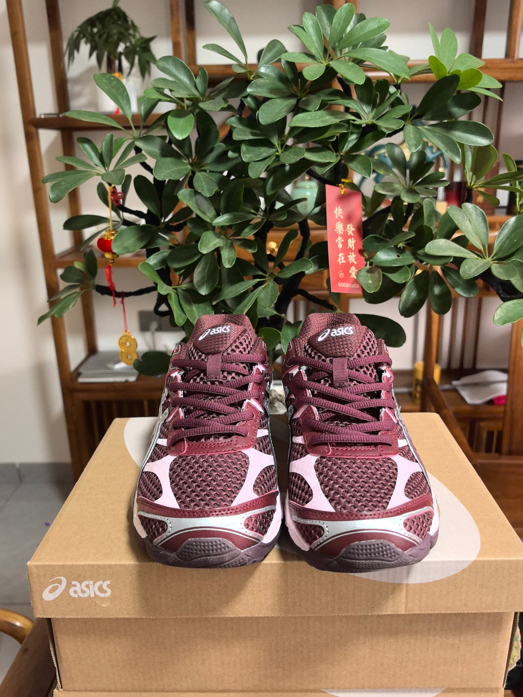 ASICS GEL-Cumulus 16 Sneakers in Sunset in Red - product image from the listing.