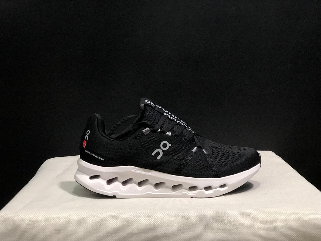 On Cloudsurfer Running Shoes in Black and White - product image from the listing.