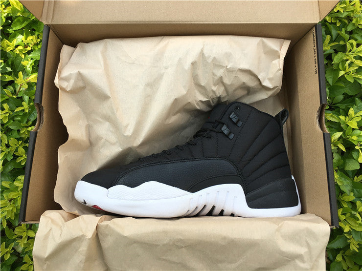 Air Jordan 12 Black Nylon High-Top Sneakers - product image from the listing.