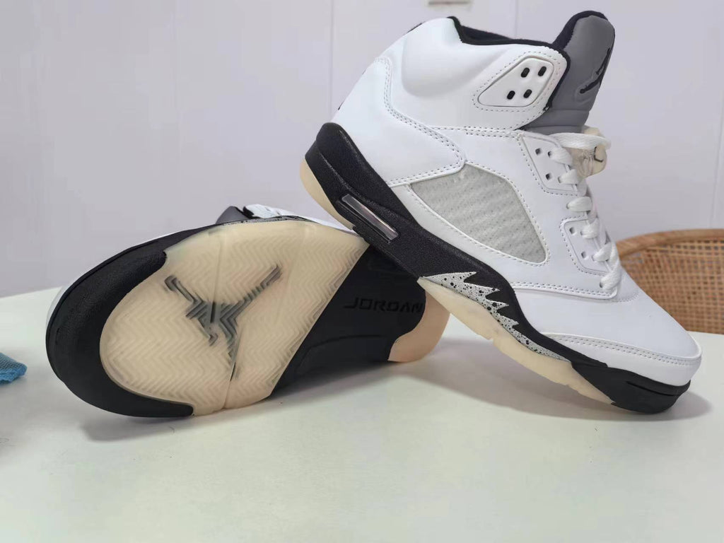 Air Jordan 5 Retro in White/Black - product image from the listing.