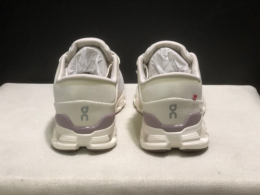 On Cloud X 4 Running Sneakers in Ivory - product image from the listing.