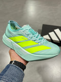 Nike Lightstrike Pro Running Shoes, in Mint Green and Volt - product image from the listing.