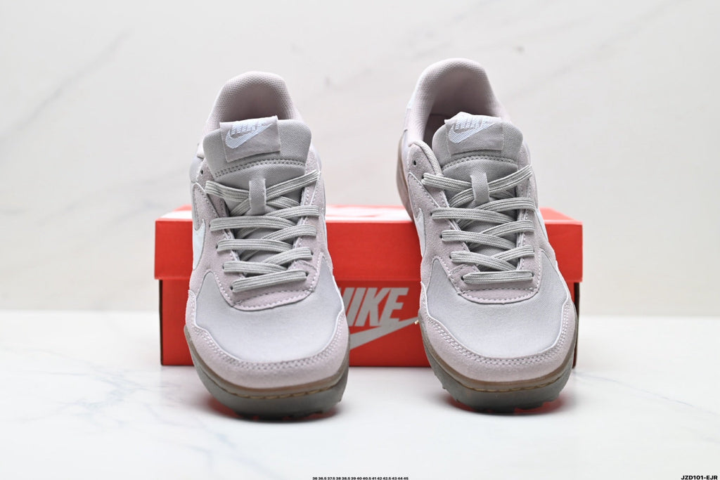 Light Gray and Pink Nike Terra Manta Sneakers - product image from the listing.
