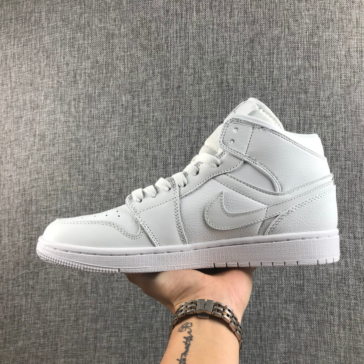 Air Jordan 1 Mid Sneakers in White - product image from the listing.