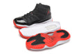 Air Jordan 11 Retro High Basketball Sneakers in Black Red - product image from the listing.