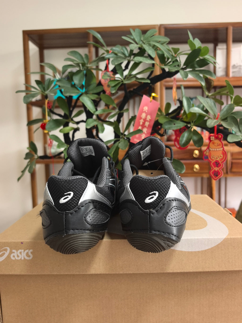 ASICS F1 Sneakers in Black and White - product image from the listing.