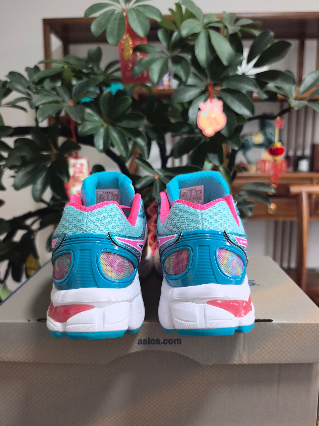 ASICS GEL-Nimbus 16 Sneakers in Pink, in Green and Blue - product image from the listing.
