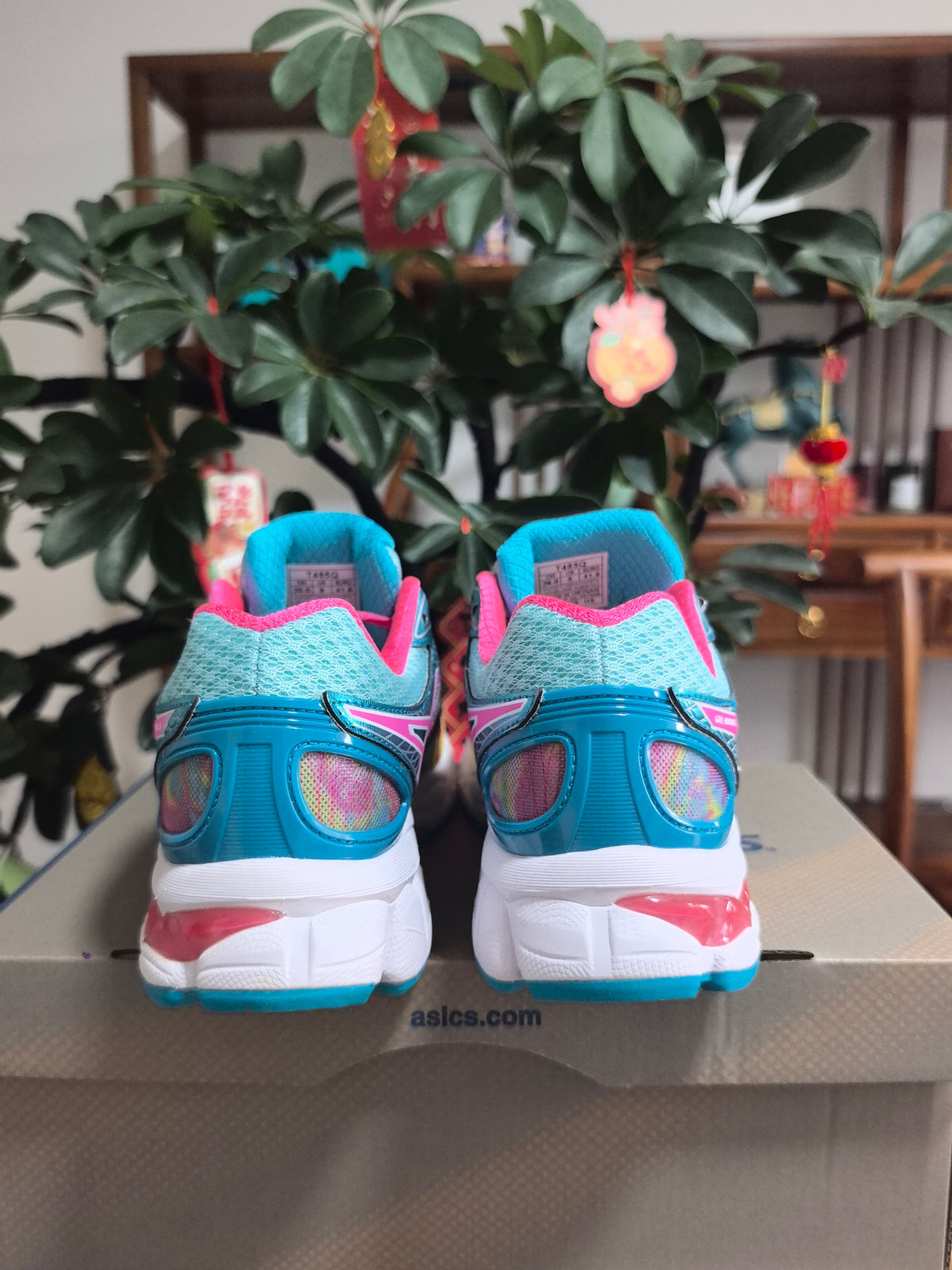 ASICS GEL-Nimbus 16 Sneakers in Pink, in Green and Blue - product image from the listing.