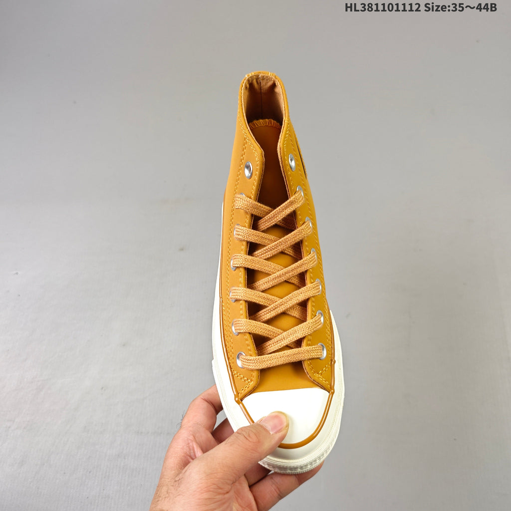 Converse Chuck 70 High Top Trainers in Mustard - product image from the listing.