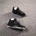 Jordan 4 KAWS Graffiti High-Top Sneakers in Black - product image from the listing.