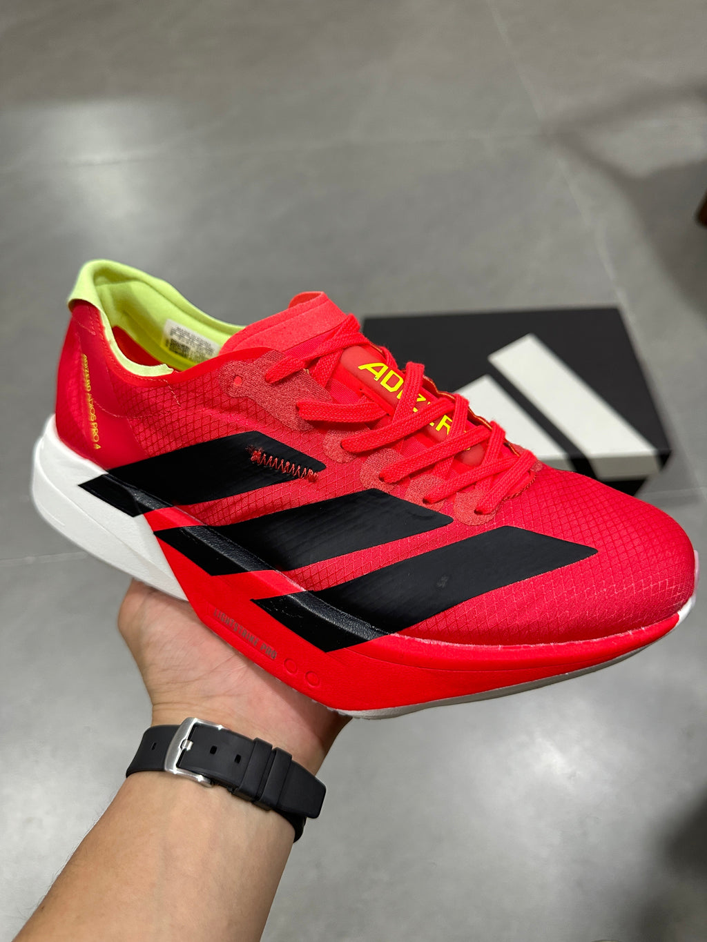 Nike Adizero Running Shoes in Red Black Volt JR6358 - product image from the listing.