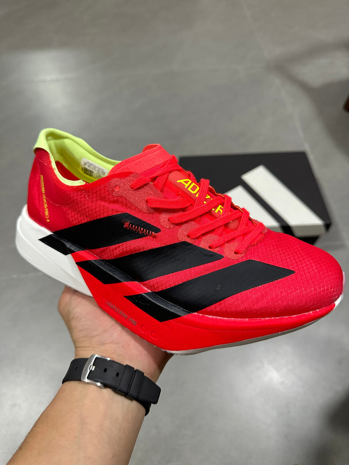 Nike Adizero Running Shoes in Red Black Volt JR6358 - product image from the listing.
