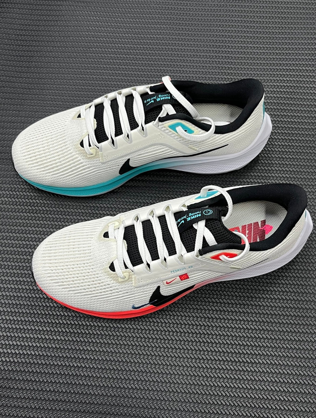 Nike Air Zoom Pegasus 40 Running Shoes in White Multicolor FZ5055-101 - product image from the listing.