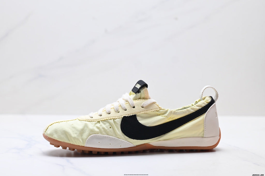 Pale Yellow and Black Nike x Jacquemus Sneakers - product image from the listing.