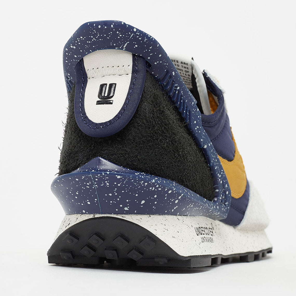 Nike x Undercover Daybreak Sneakers in Navy Gold CJ3295-400 - product image from the listing.