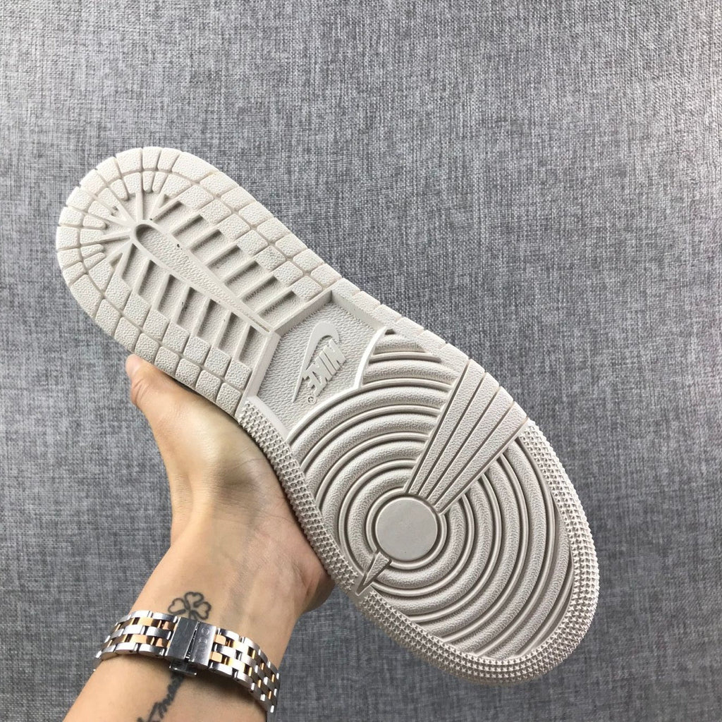 White and Grey Air Jordan 1 Mid Sneakers - product image from the listing.