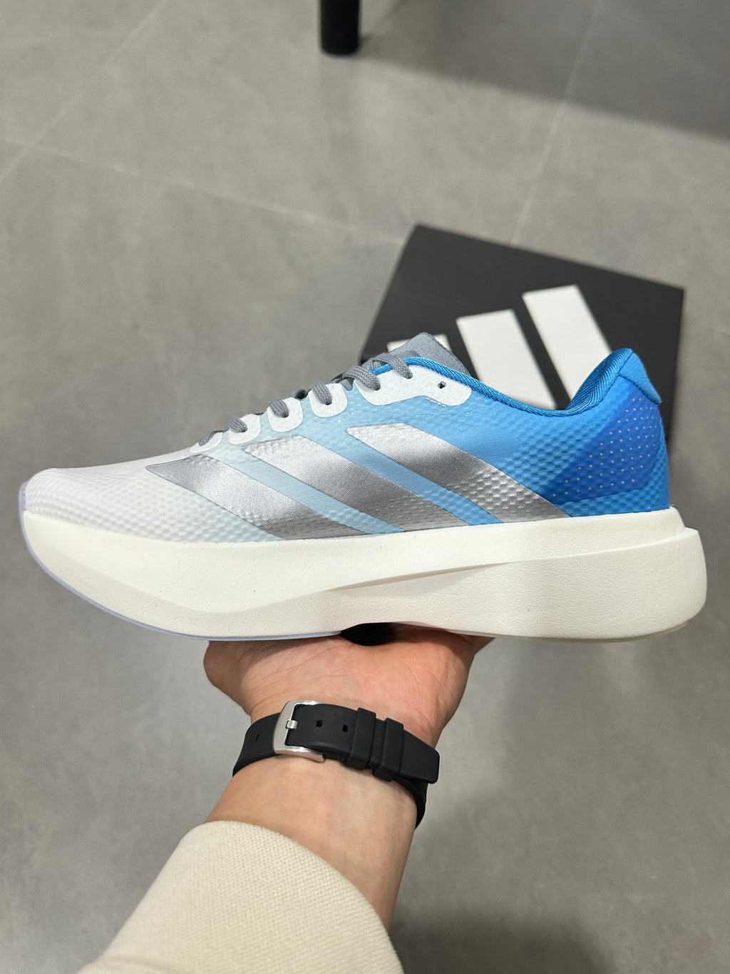 adidas Adizero EVO SL Running Shoes in White Blue JR2027 - product image from the listing.