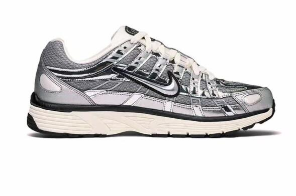 Nike Silver Grey Mesh Running-Style Trainers - product image from the listing.