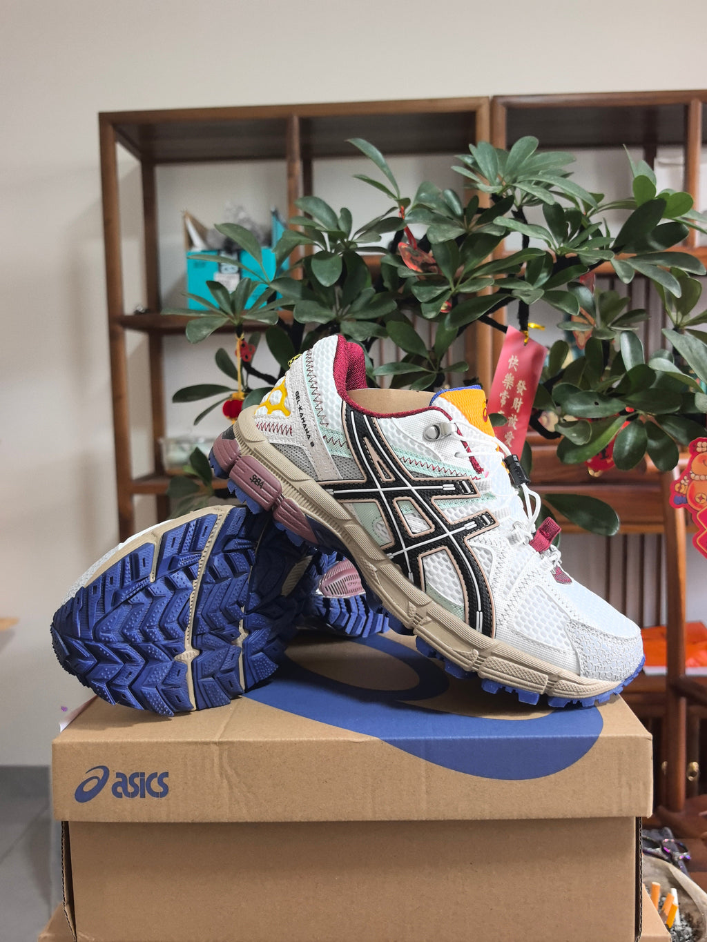 ASICS GEL-KAYANO 5 Sneakers in White Black Red - product image from the listing.