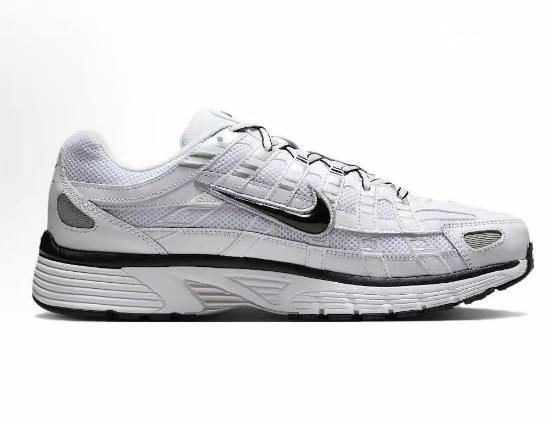 Nike Silver White Black Swoosh Trainers - product image from the listing.