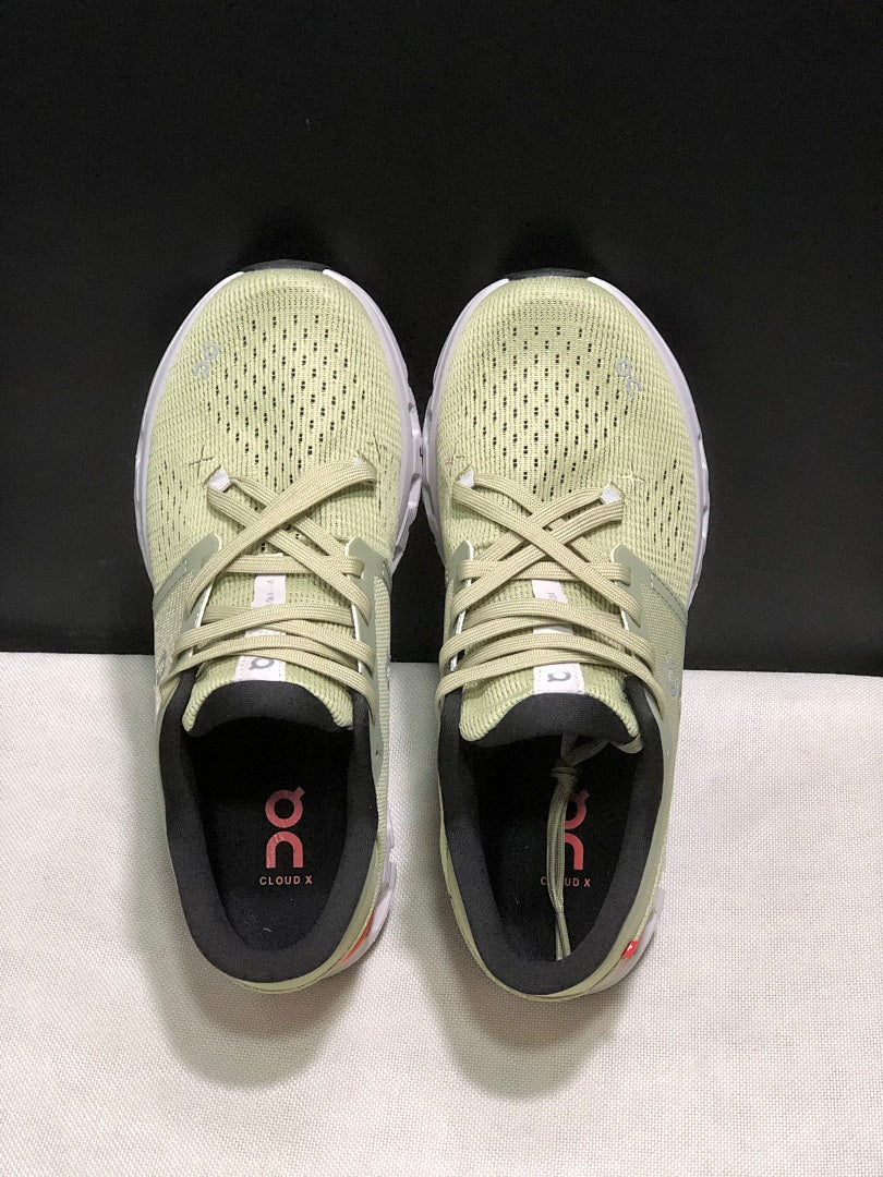 On Cloud X 4 Sneakers in Sage in Green - product image from the listing.