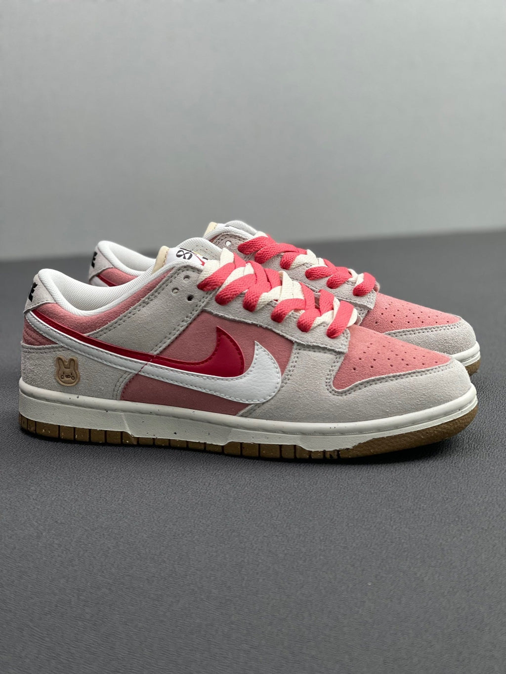 Nike Dunk Low SE Rabbit Year Sneakers in Pink White DO9457-117 - product image from the listing.