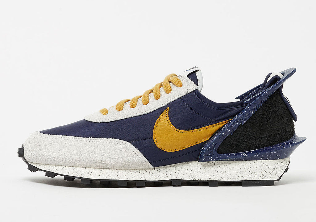 Nike x Undercover Daybreak Sneakers in Navy Gold CJ3295-400 - product image from the listing.