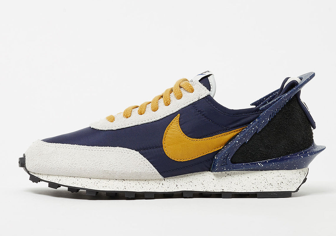 Nike x Undercover Daybreak Sneakers in Navy Gold CJ3295-400 - product image from the listing.