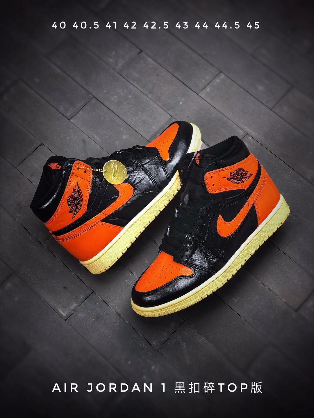 Air Jordan 1 Retro High OG Sneakers in Black and Orange - product image from the listing.