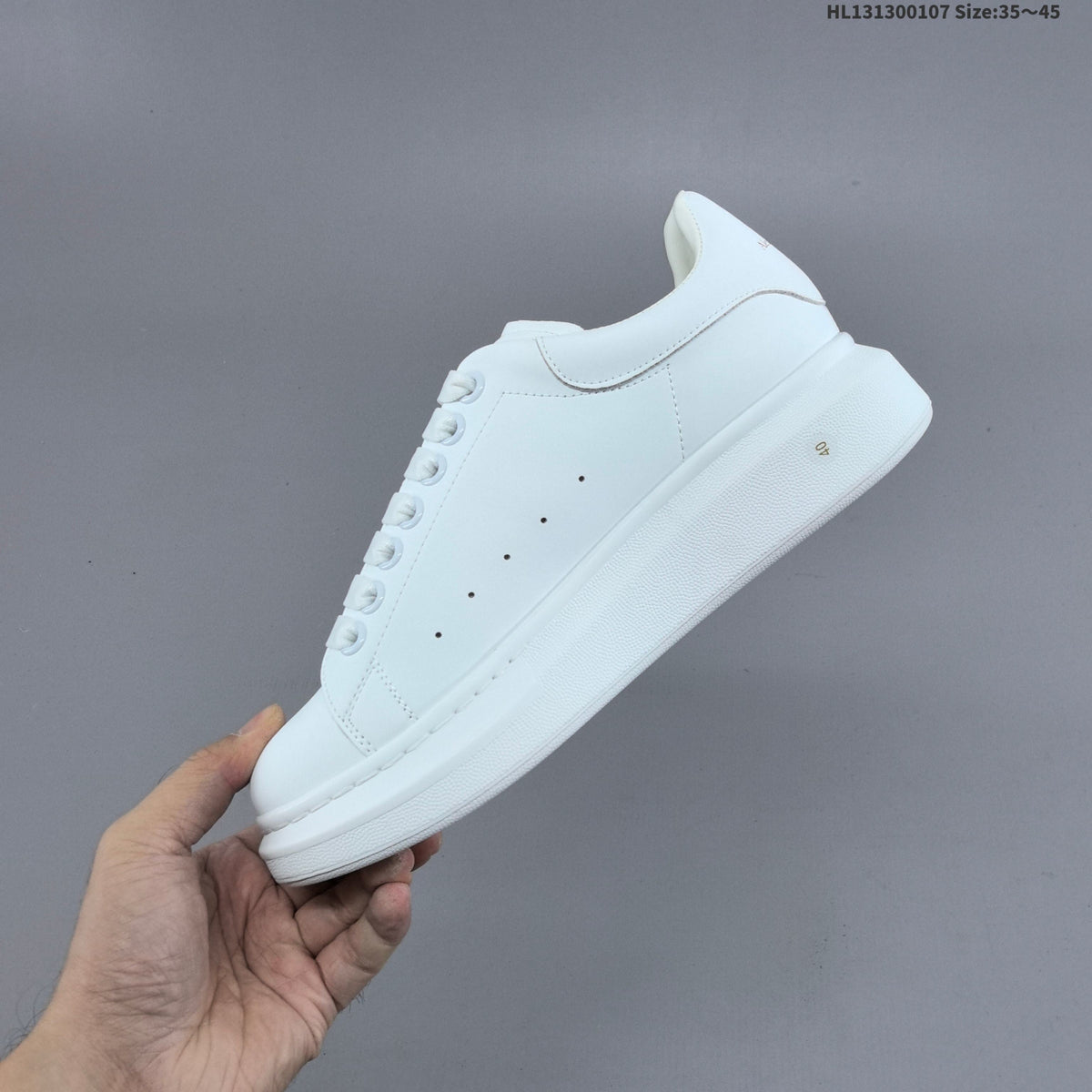 Alexander McQueen Oversized Sole Trainers with Graphic Logo - product image from the listing.
