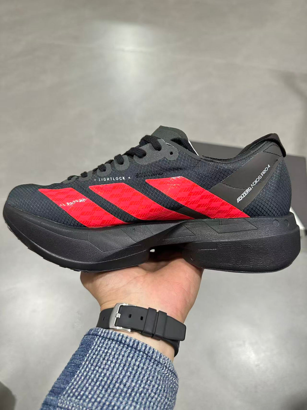 Adidas Lightstrike Pro Running Shoes in Black Red KH8840 - product image from the listing.