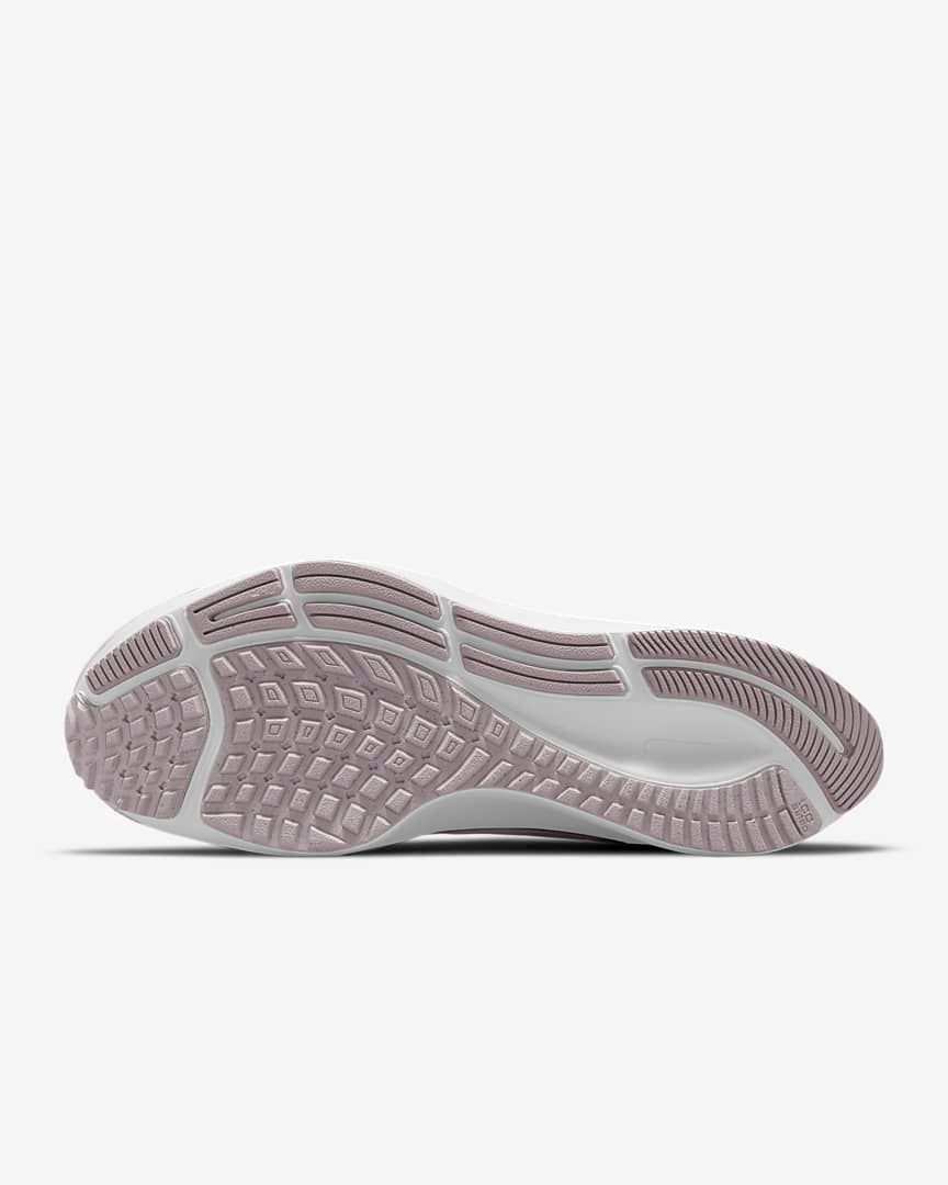 Nike Air Zoom Pegasus 38 Running Shoes in Pink CW7358-601 - product image from the listing.