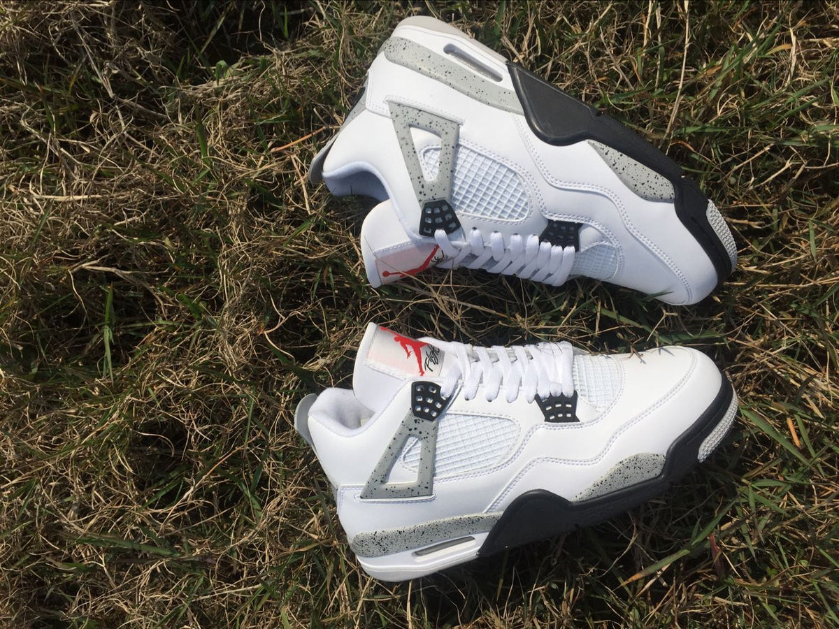 Men's Jordan 4 Retro White Cement Sneakers - product image from the listing.