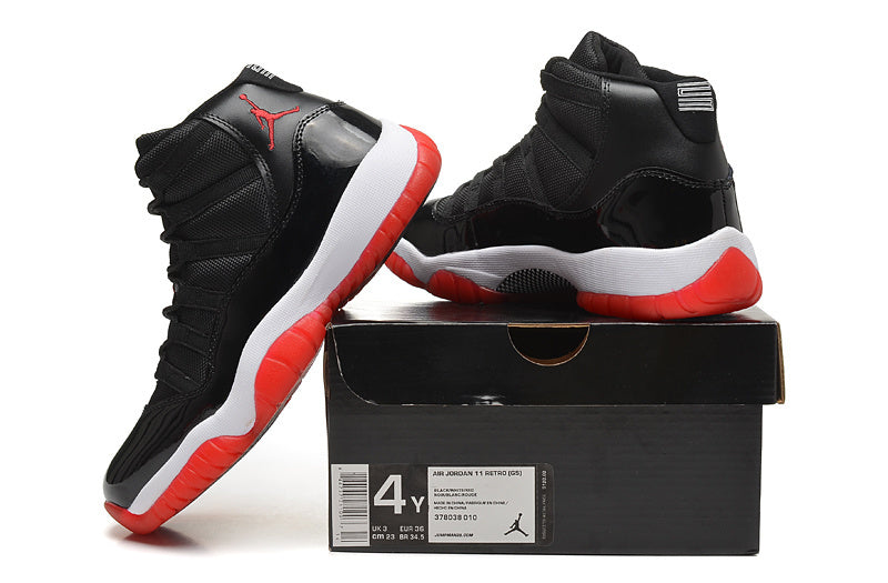 Air Jordan 11 Retro High Basketball Sneakers in Black Red - product image from the listing.
