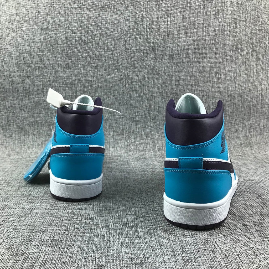 Air Jordan 1 Mid Sneakers in Blue, in White and Black - product image from the listing.