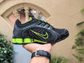 Nike Shox Sneakers in Black and Volt Green - product image from the listing.