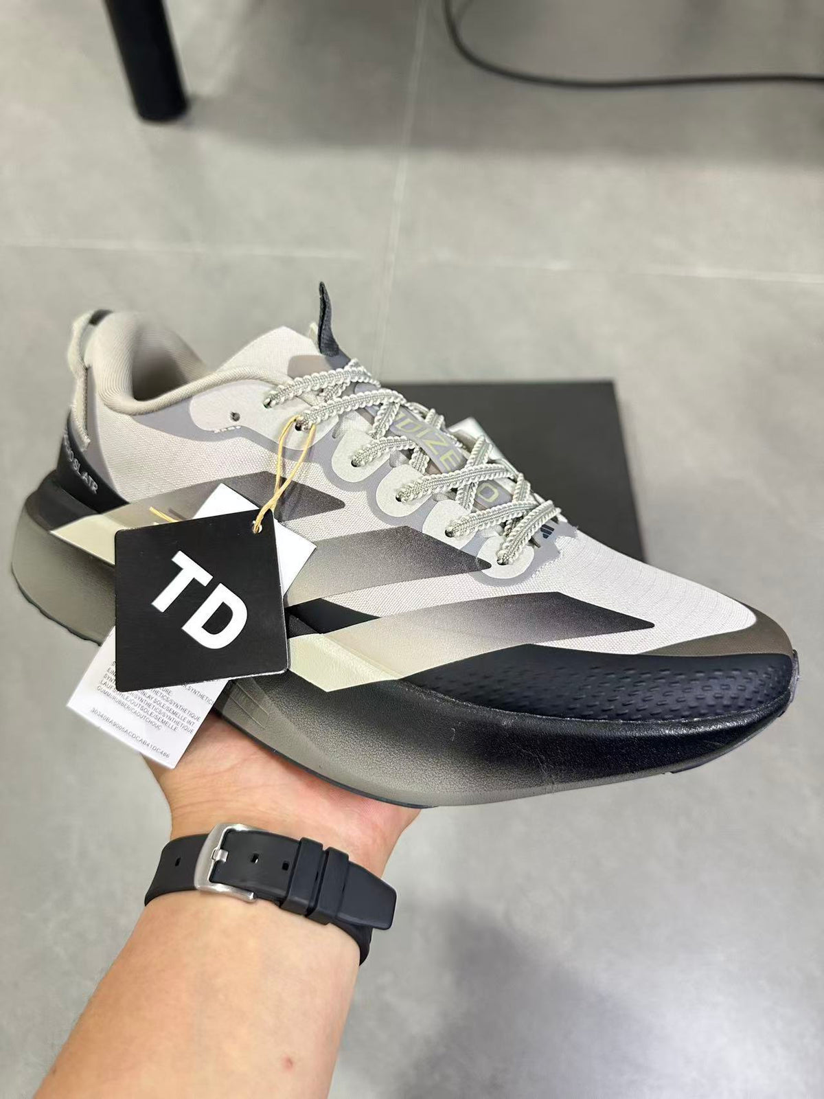 Adizero SL ATR Running Shoes in Black Brown KK0309 - product image from the listing.