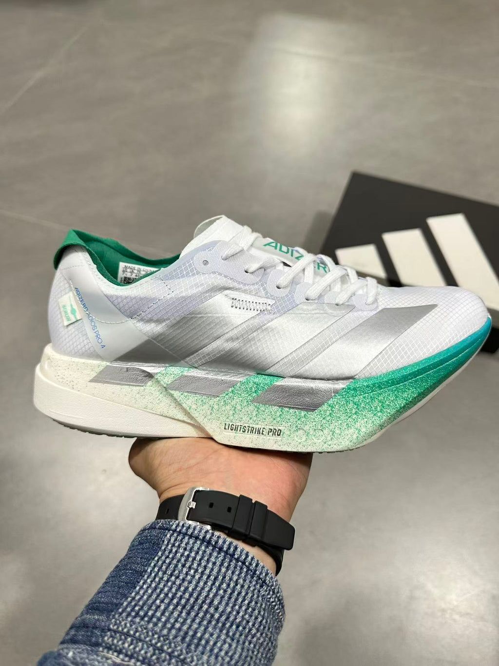 Adidas Adizero Prime X 2 Strung Running Shoes in White Green - product image from the listing.