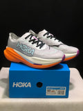 Gray and Orange HOKA Mach X 2 Running Shoes - product image from the listing.