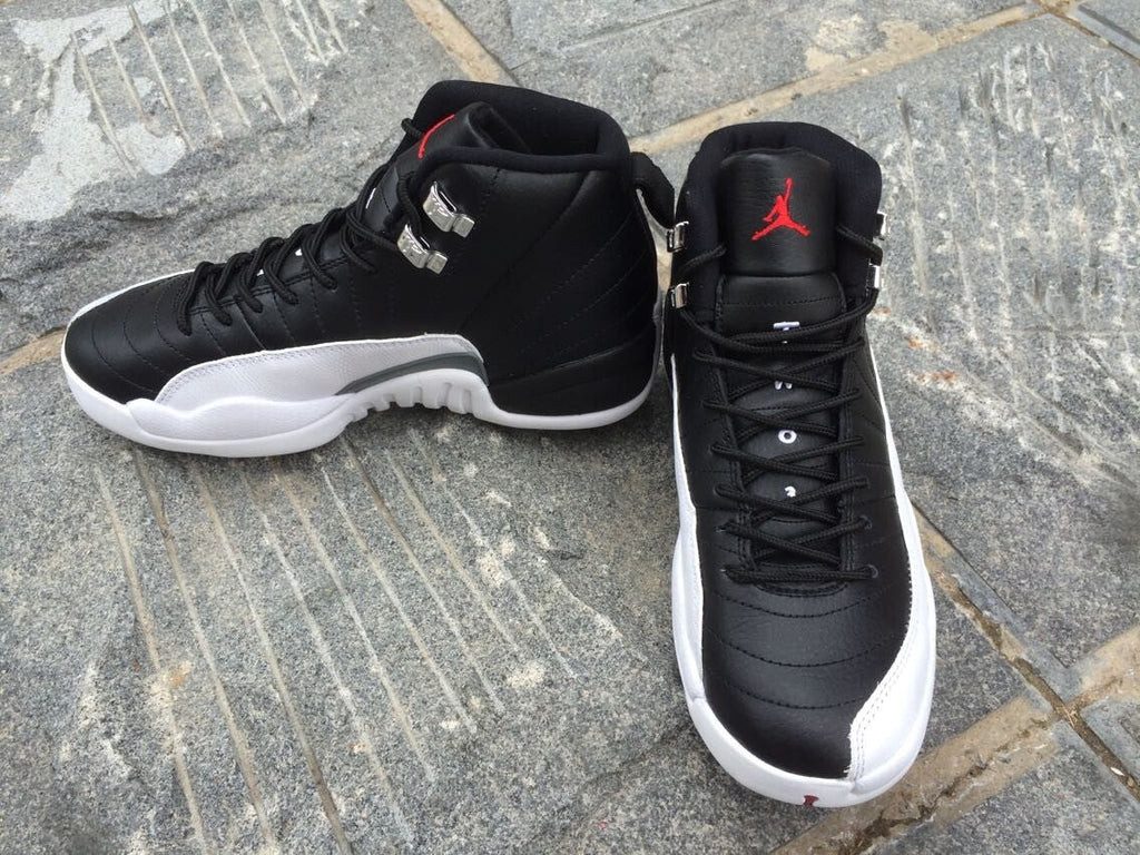 Women's Air Jordan 12 High-Top Sneakers, Black and White - product image from the listing.