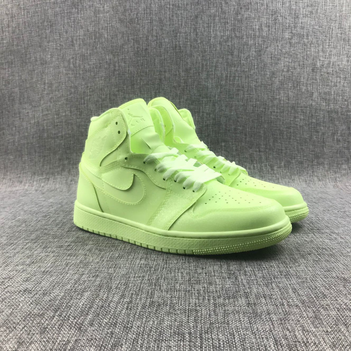Air Jordan 1 Mid AH7389-700 Sneakers in Volt - product image from the listing.