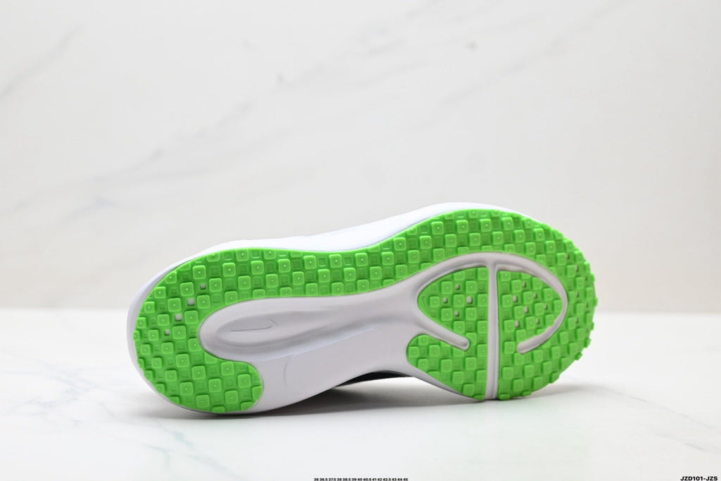 Nike Revolution 8 Running Shoes in White and Green - product image from the listing.