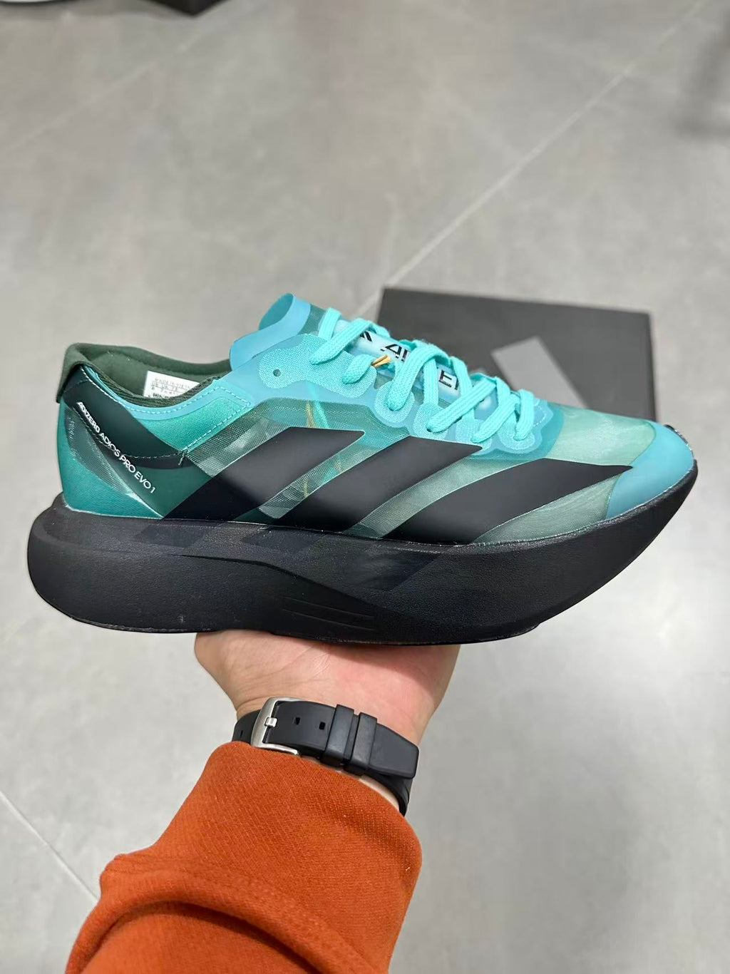 Nike Air Max Scorpion Flyknit Sneakers, in Turquoise and Black IH5588 - product image from the listing.