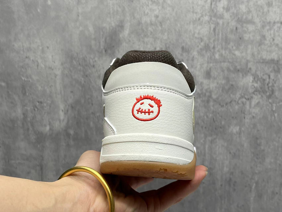 TS Reverse Swoosh Sneakers in White & Brown - product image from the listing.