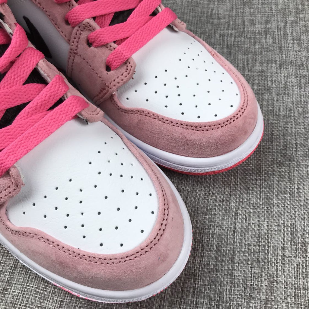 Air Jordan 1 Mid Sneakers in Pink 852542-801 - product image from the listing.