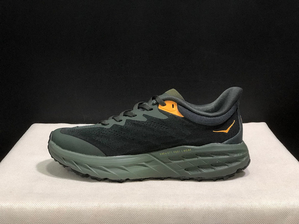 HOKA Speedgoat 5 Trail Running Shoes, in Black and Olive - product image from the listing.