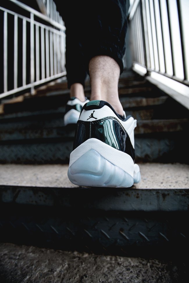 White and Black Air Jordan 11 Iridescent Sneakers - product image from the listing.