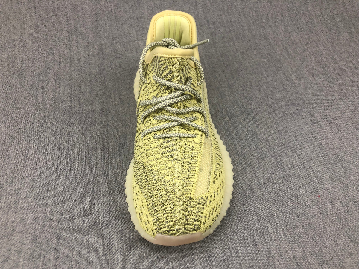 Yellow and Olive Yeezy 350 V2 Kids Sneakers - product image from the listing.